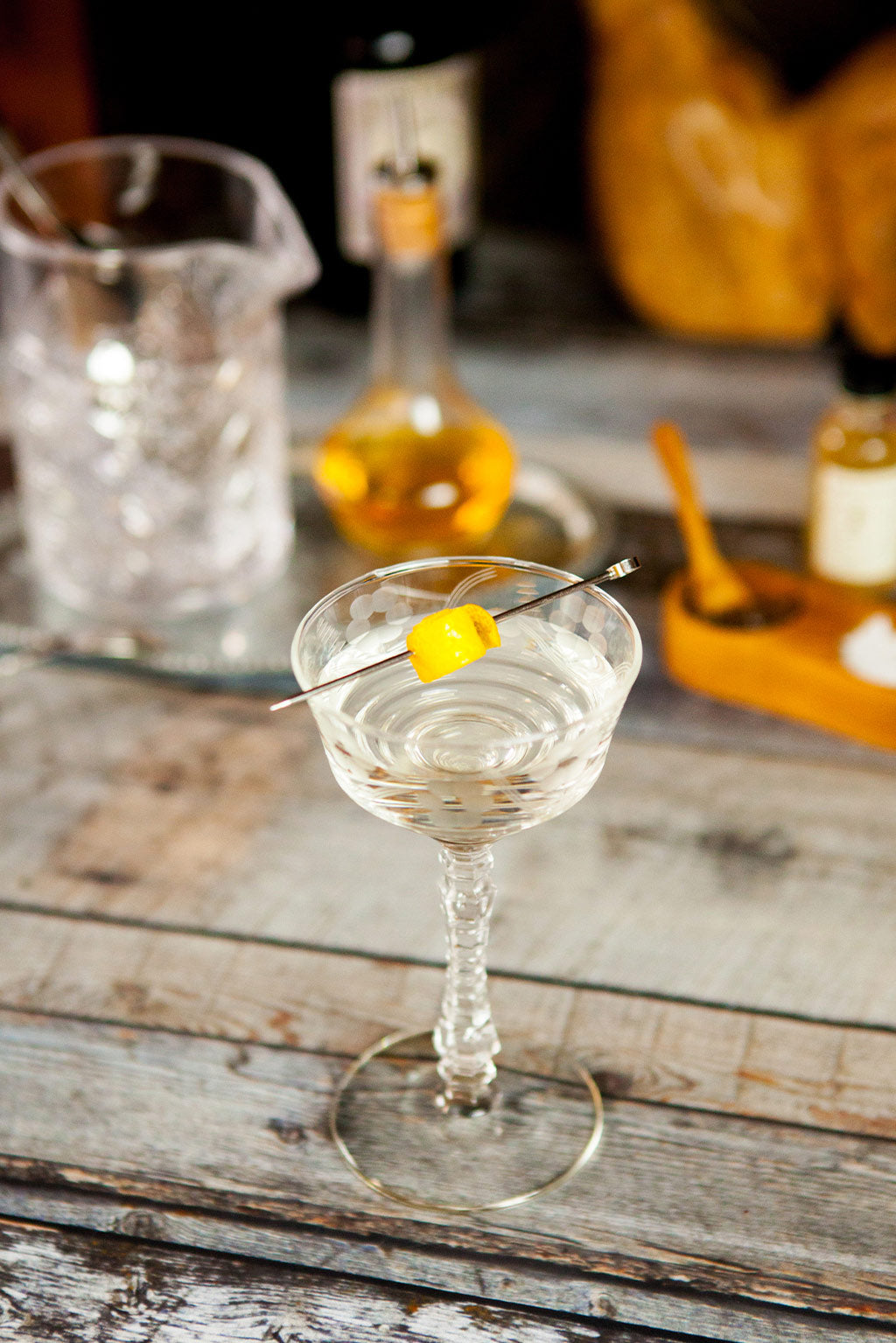 Martini with bar tools in the background